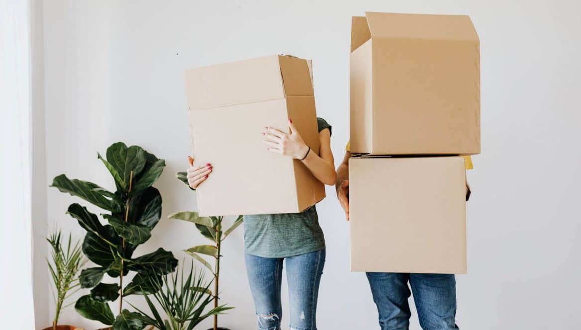 Couple with packing boxes